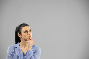 Caucasian woman on grey background