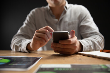  Caucasian man using a smartphone