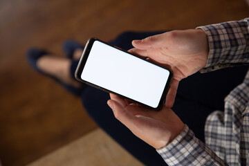 Caucasian woman using a smartphone 