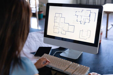 Asian architect woman working on computer 