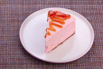 delicious cheesecake with strawberries on  plate