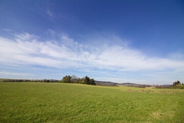 landscape of  meadow an blue sky