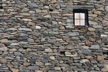 Stone house in Valmeinier mountains in winter skiing area in the French Alps Savoie