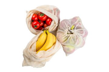 tomatoes, banana and apples in eco friendly mesh bags isolated, zero waste concept