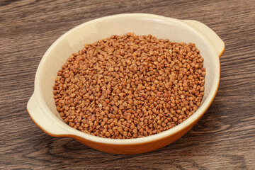 Raw buсkwheat cereal in the bowl