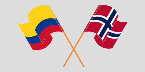 Crossed and waving flags of Colombia and Norway