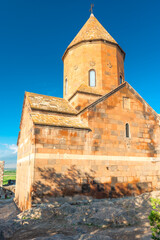 Fototapeta premium Khor Virap monastery close-up on a background of blue sky, a landmark of Armenia