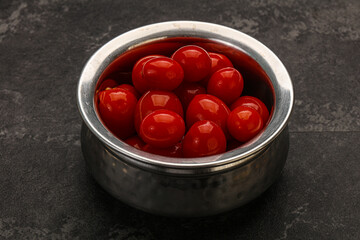 Pickled cherry tomatoes in the bowl