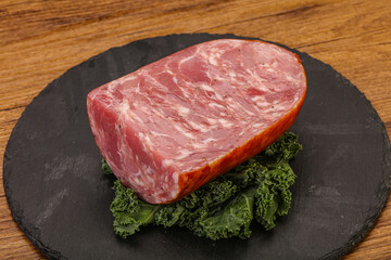 Beef ham piece over board