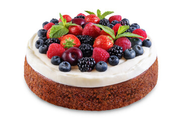 Cake with cream cheese frosting, mint leaves and berries jn a white isolated background