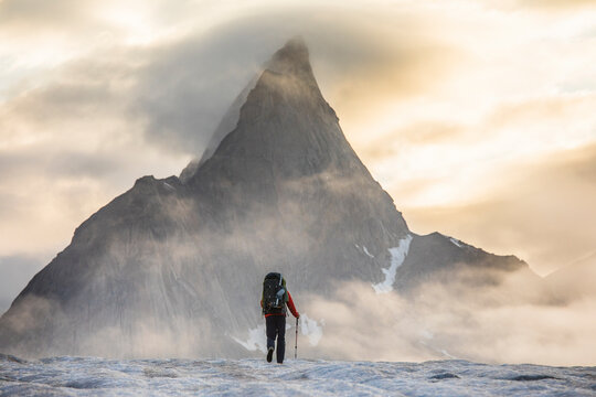 Mountaineer prepares for a day of climbing on Baffin Island.