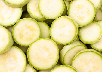 Sliced zucchini, background. The view from top