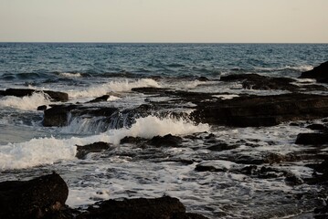 waves breaking on the rocks