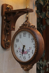 Retro style wall clock. Vintage colors.