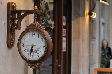Retro style wall clock. Vintage colors.