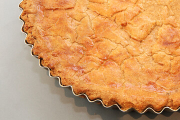 homemade pie in gray background
