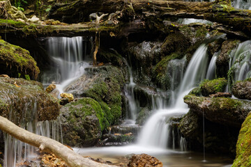 The water cascades down from the springs deep in the woods. This tranquil park is a beautiful place to visit during the summer and fall.