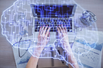 Double exposure of woman working on computer andhuman brain hologram drawing. Top View. Ai concept.