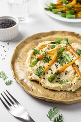 Hummus and grilled carrots