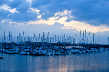Boats at a bay with blue sky