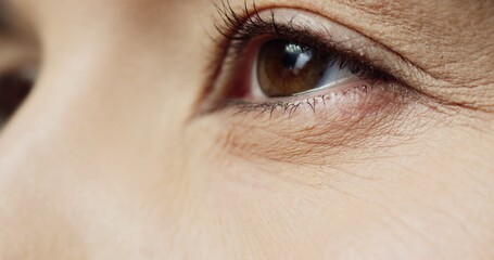 Close up shot of young woman face with big eyes. Cosmetology, beauty and Spa