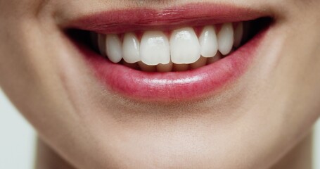 Close up face portrait of smiling model girl with healthy white teeth. Stomatology concept, strong white teeth