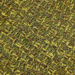 Closeup of handwoven fabric in green and brown