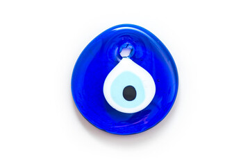 Glass Turkish eye “Nazar Boncugu” on the white background.