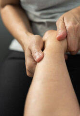 physiotherapist hands treating patients injured wrist