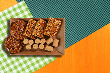 Food group of Festa Junina, a typical Brazilian party on yellow background and top view