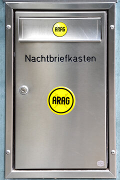Sign of Arag SE on a night mailbox. Arag is a European insurance group