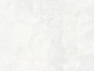 The surface of the white concrete wall.