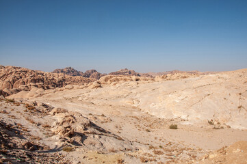 Fototapeta na wymiar Ancient tombs carved in stone in Petra, Jordan