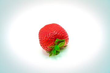 Close-up view of fresh strawberry isolated in white