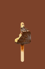 the last bit of chocolate outer popsicle on brown background