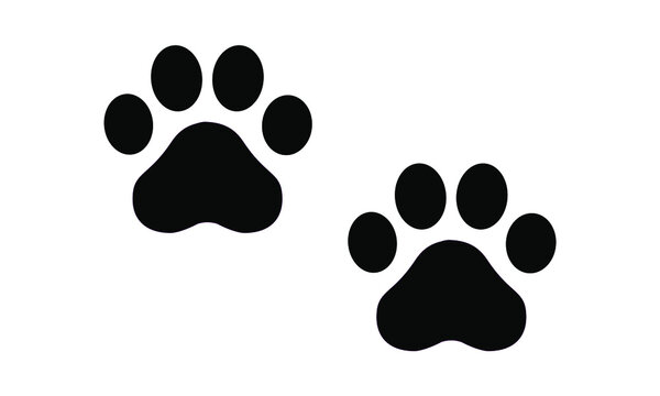 Cute kitten or kitty cat paw prints simple black vector silhouette