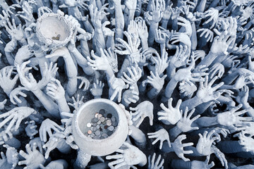 The Hands from hell in Wat Rong Khun