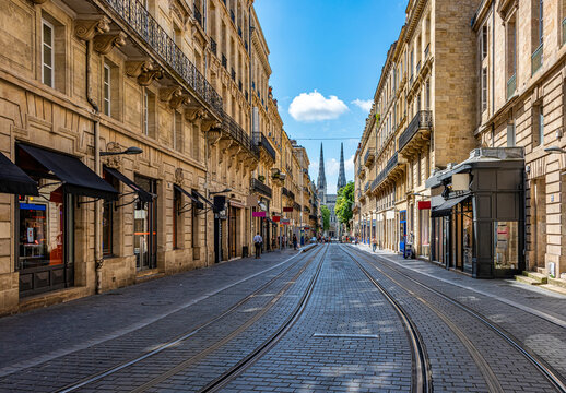 Fototapeta A pic of a Street in Bordeaux France with the cathedral at the end 