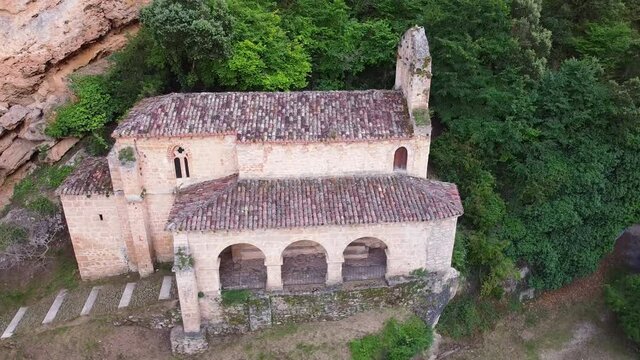Aerial view of an ancient hermitage located in Tobera, Burgos, Spain. High quality 4k footage