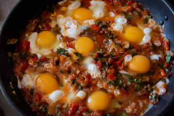 fried eggs in a pan