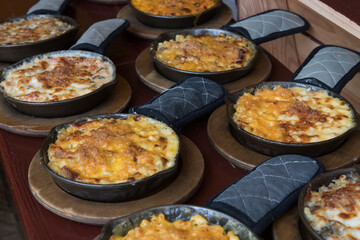 Homemade Baked Mac and Cheese on wooden table