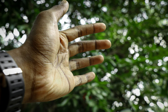 hands of a man in the air