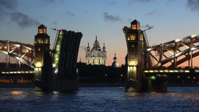 Smolny Cathedral in the fold of the divorced Bolsheokhtinsky bridge on a June night. Saint Petersburg, Russia  