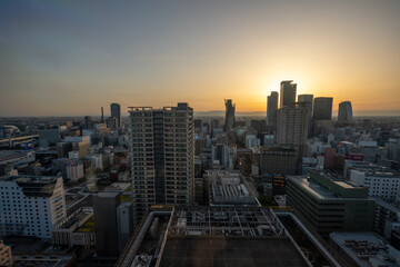 Fototapeta na wymiar Beautiful Sunset in Nagoya, Japan with dense urban cityscape view