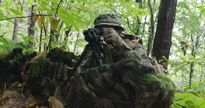 Soldiers or private military contractors aiming with rifle. war, army, weapon, technology and people concept