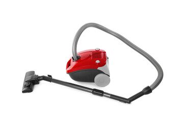 Modern red vacuum cleaner isolated on white