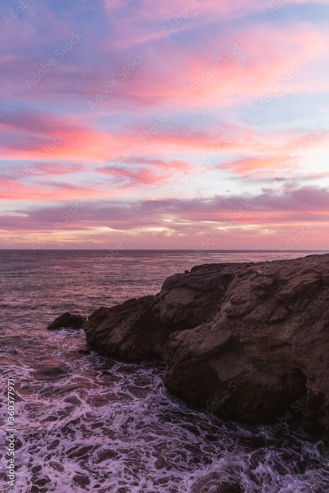 Wall mural pink sunset at the beach in Malibu, California 