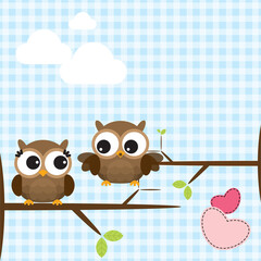 Cute owls couple on the tree branch. Vector illustration