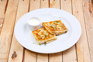 tasty breakfast on the wooden background