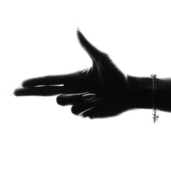 silhouette of fingers pointing like a gun